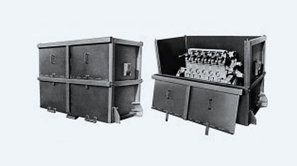 Pallets and containers for transporting diesel cat engines
